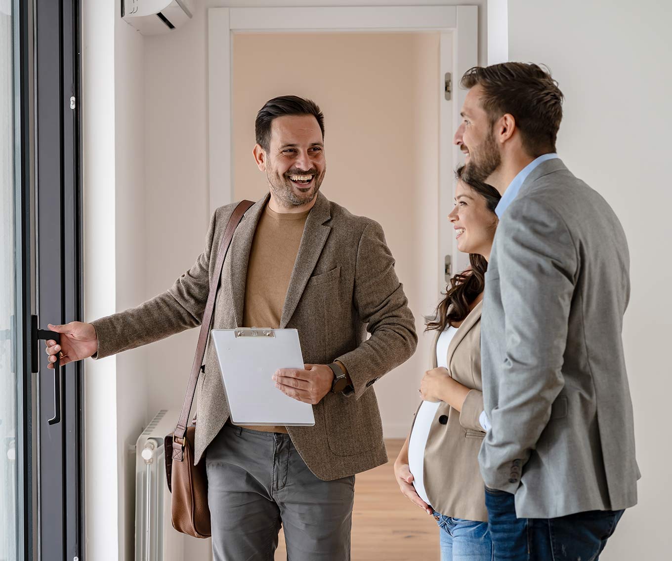 Couple meets with REALTOR to buy a house.